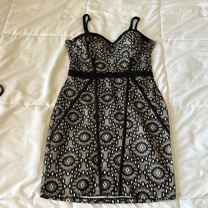 Cute short gold/black dress. Size xs